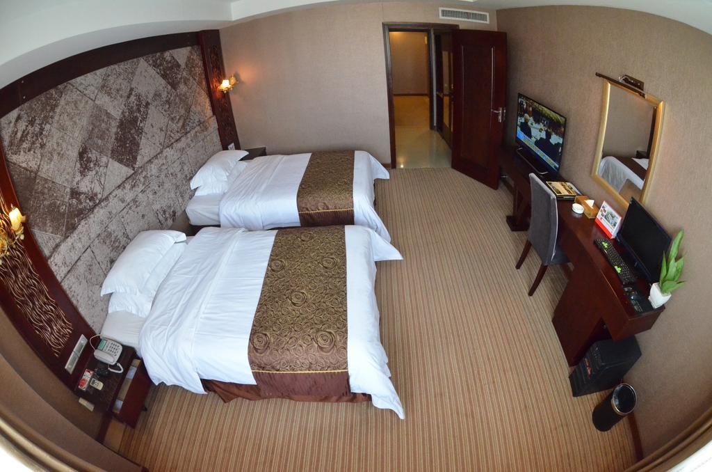 Xiamen Wanjia Oriental Hotel Стая снимка